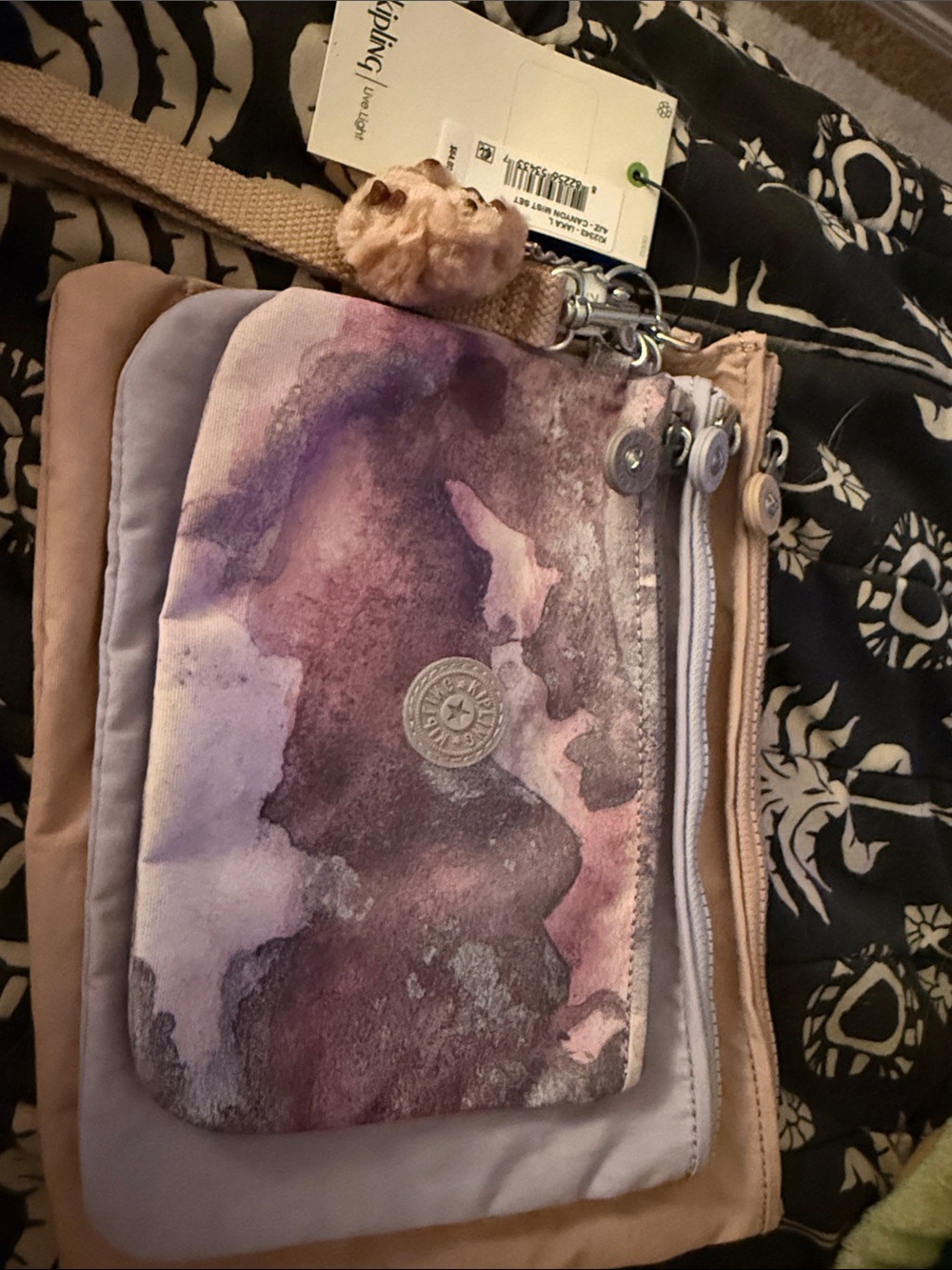 NWT Kipling pouches in 3 sizes in Purple, Beige and watercolor